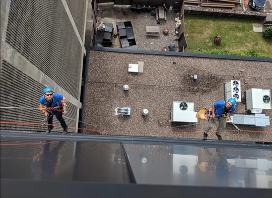 Clear Choice Services crew Milwaukee window cleaning