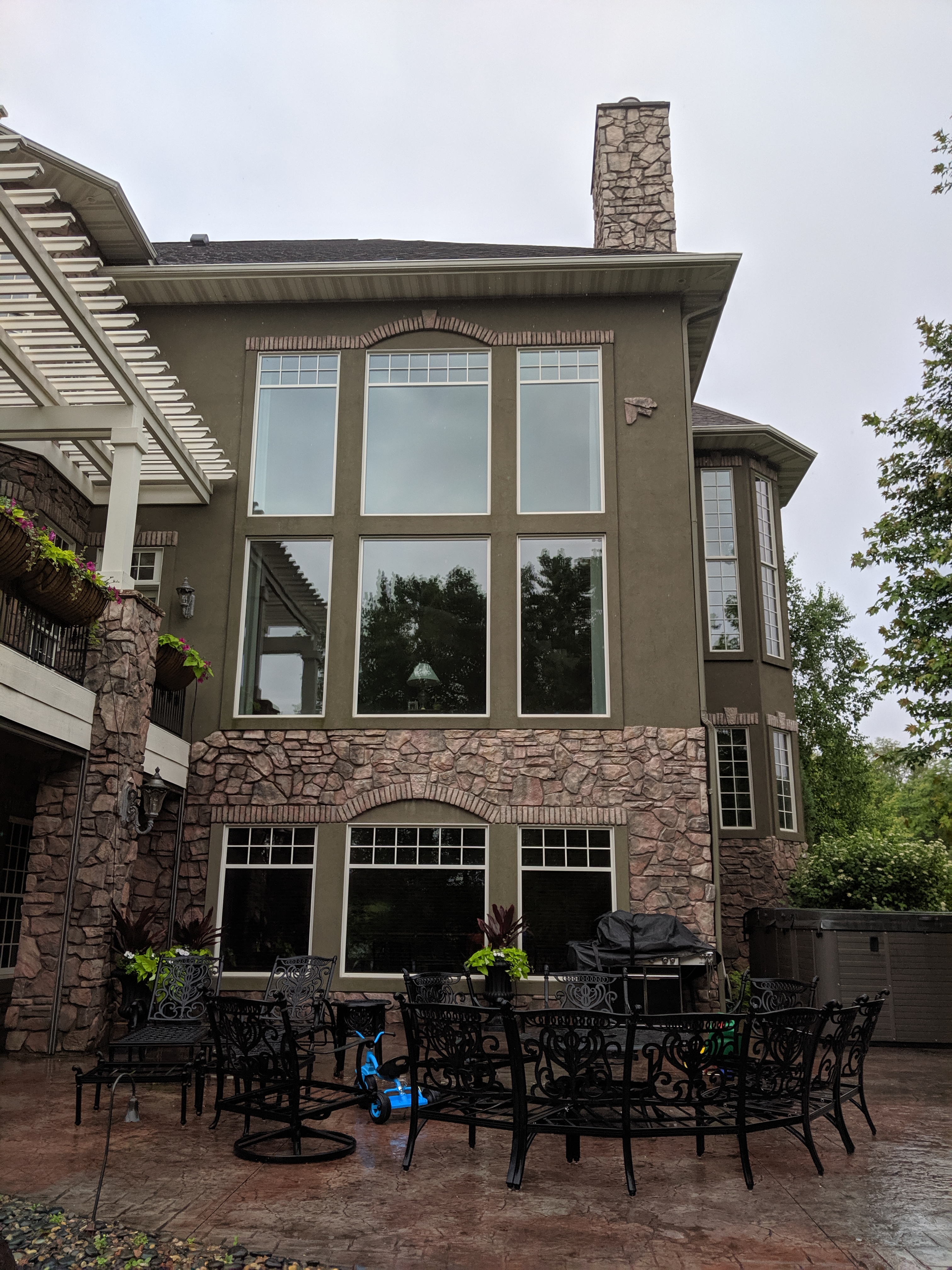 Window cleaning technician completing exterior glass